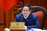 越南政府总理范明政发表讲话。图自越通社