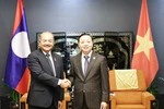 陈红河副总理会见老挝副总理吉乔·凯坎匹吞。图自越通社