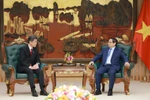 越南政府总理范明政：积极拓展越南与新加坡两国多领域的合作