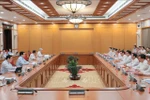 国家主席梁强主持会议。图自越通社