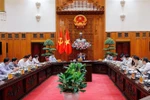 越南政府总理范明政主持召开政府常务委员会会议。图自越通社