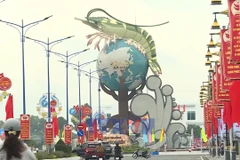 团结奋进，竞相建功，喜迎越共第十四次全国代表大会