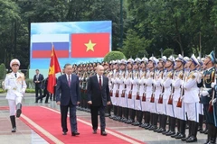 2024年6月20日，越南国家主席苏林在河内举行隆重仪式，欢迎俄罗斯总统普京对越南进行国事访问。图自 越通社
