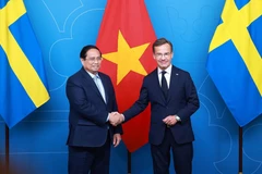 瑞典首相乌尔夫·克里斯特松迎接越南政府总理范明政到访。图自 越通社
