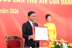 庆祝越共十四大纪念邮票首发仪式举行