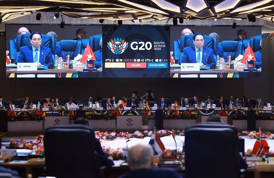 越南政府总理范明政在G20峰会全体会议上发表讲话。图自越通社