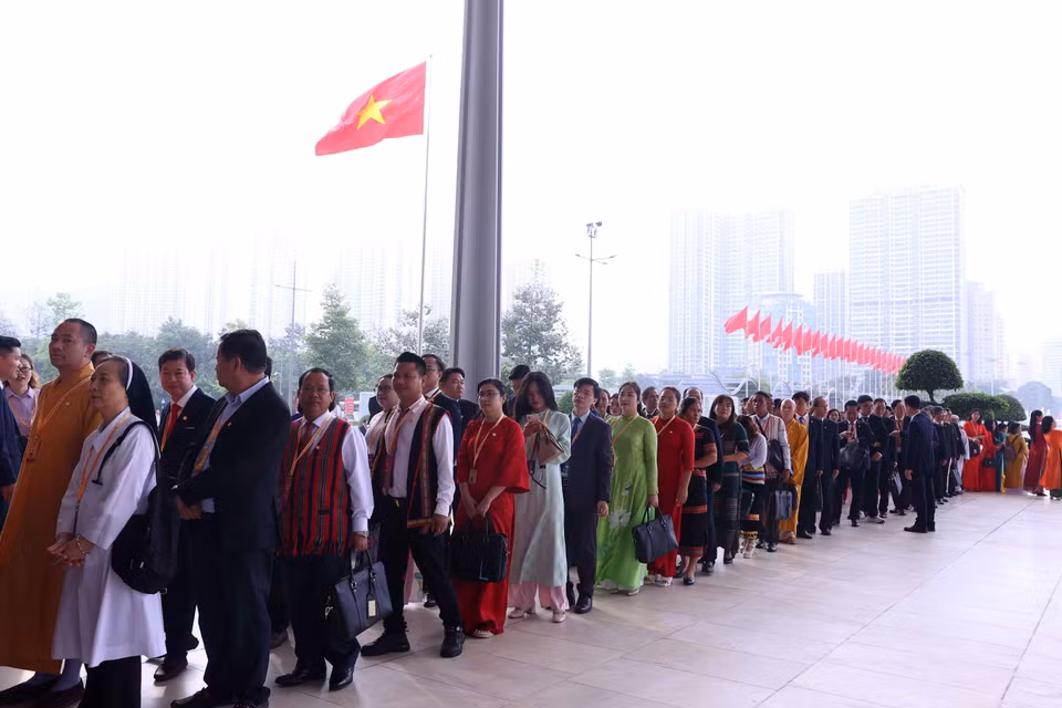 与会代表出席越南祖国阵线第十一次全国代表大会开幕式。图自越通社