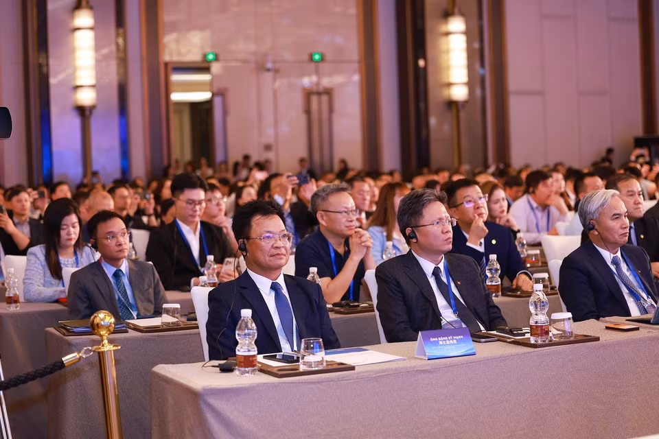 越南和中国企业代表出席论坛。图自越通社