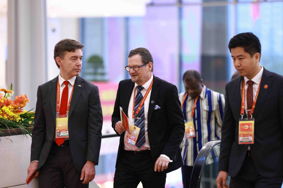 各国际代表出席越共十四大开幕式。图自越通社