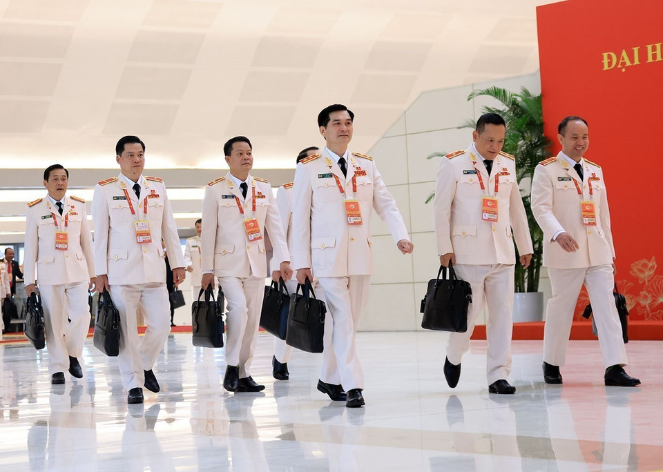 各位代表出席越共十四大开幕式。图自越通社