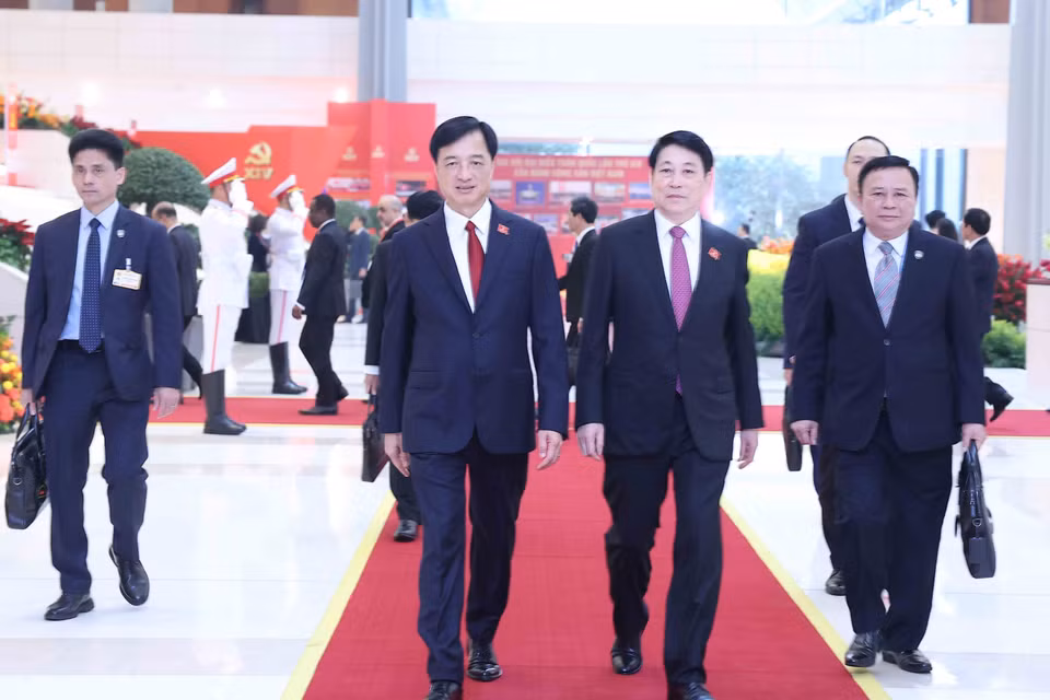 国家主席梁强与河内市委书记阮维玉出席大会开幕式。图自越通社