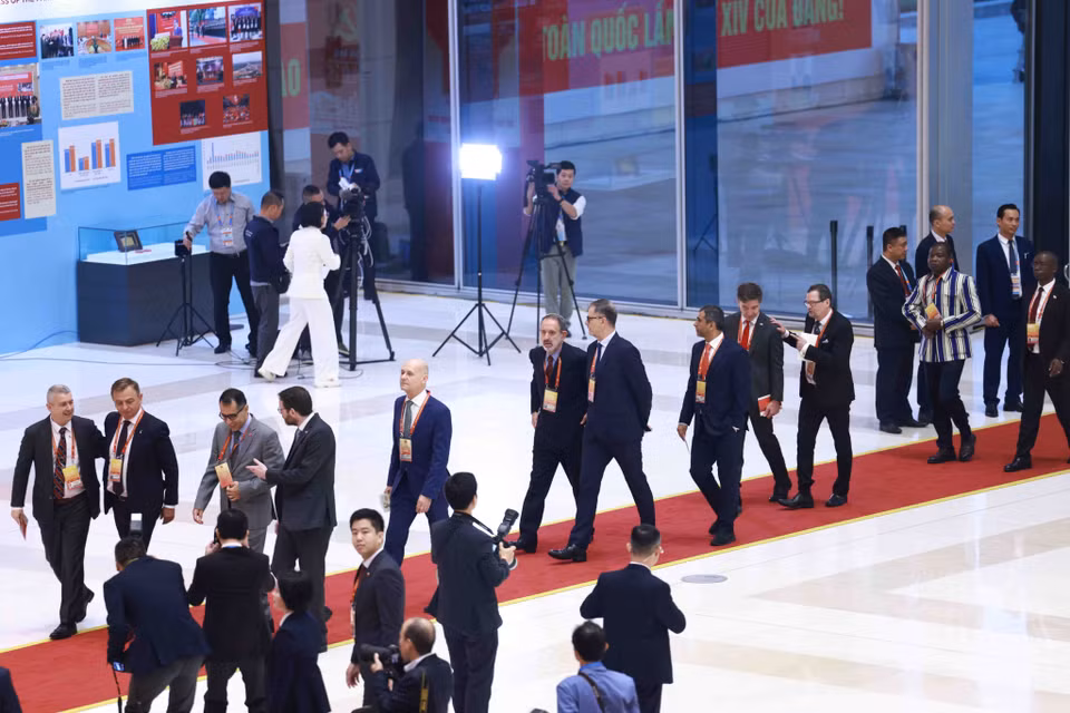 各国际代表出席越共十四大开幕式。图自越通社