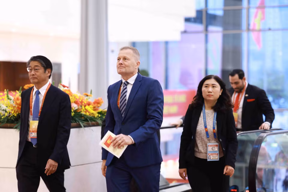 各国际代表出席越共十四大开幕式。图自越通社