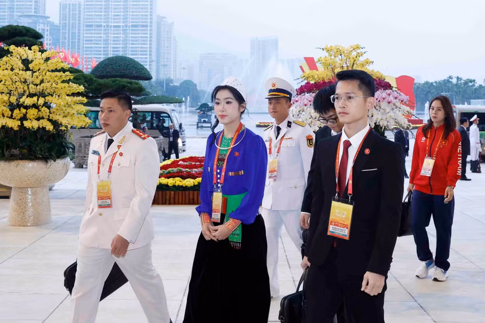 各位代表出席越共十四大开幕式。图自越通社