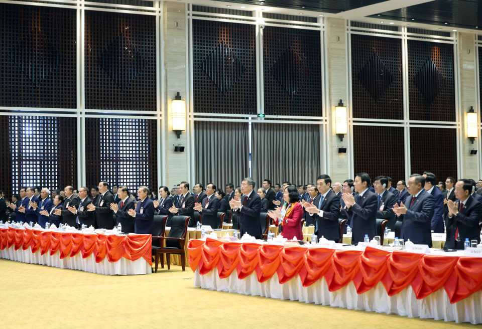 与会代表出席会议。图自越通社