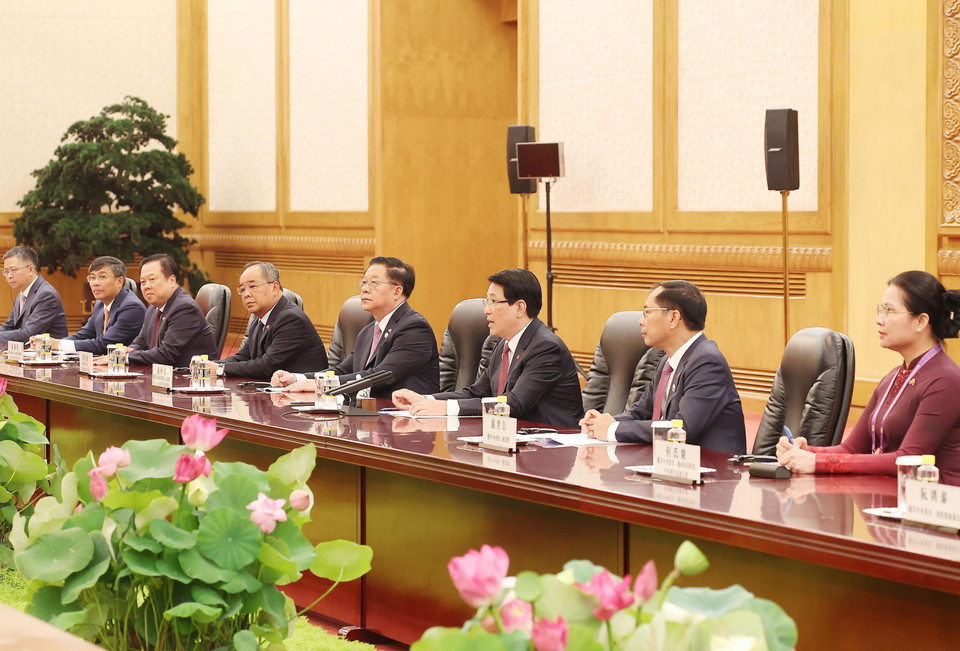 国家主席梁强同中共中央总书记、国家主席习近平举行会谈。图自越通社