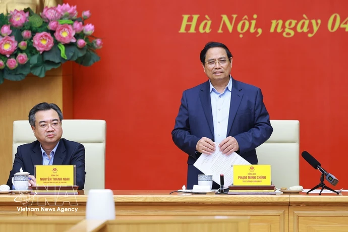 政府总理范明政发表讲话。图自越通社