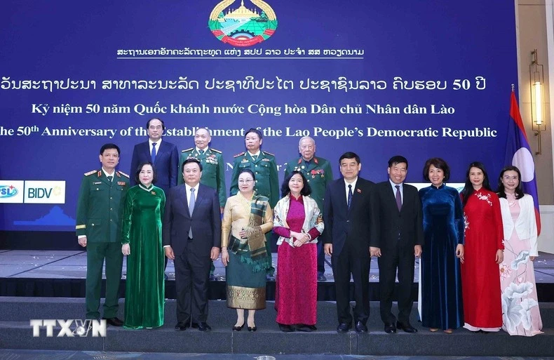 与会代表合影。图自越通社