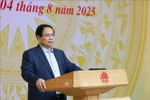 范明政总理发言。图自越通社