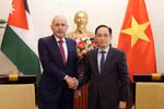 越南外交部长与约旦副首相兼外交与侨务大臣。图自越通社