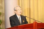 附图：原国家主席陈德良。图自越通社