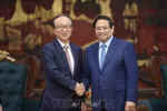 越南政府总理范明政会见日本三菱日联金融集团社长龟泽宏规。图自越通社