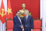 越共中央总书记苏林与印度阿达尼集团董事长高塔姆·阿达尼。图自越通社