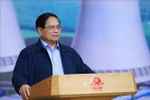 越南政府总理范明政发言。图自越通社