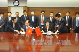 越中经贸合作委员会第九次会议纪要签约仪式（图片来源：越通社）
