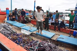 2015年7月被中国船只攻击的越南渔船（图片来源​：劳动报）