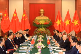 越共中央总书记阮富仲与中共中央总书记、国家主席习近平举行会谈（图片来源：越通社）