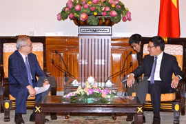 越南政府副总理兼外交部长范平明会见了来访的日越友好协会关西地区分会主席祯西村