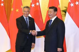 中共中央总书记，国家主席习近平与新加坡总理李显龙。