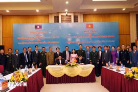 越南广平省与老挝沙湾拿吉省关于2025年边境保护的合作谅解备忘录签署仪式。图自越通社