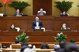 越南公安部部长梁三光大将作报告。图自越通社