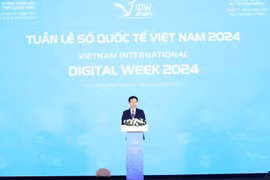 信息技术部部长阮孟雄发表讲话。图自越通社