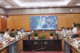 工作会议场景。图自越通社