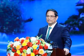 越南政府总理范明政在会议上发表讲话。图自越通社