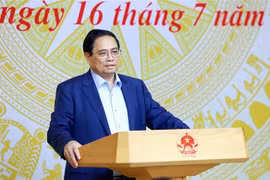 越南政府总理范明政在会议上发表讲话。图自越通社