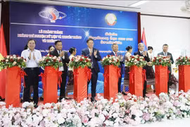  越南援老挝自然灾害数据和通信实验室落成仪式场景。图自越通社