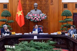 会议场景。图自越通社