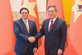 越南政府总理范明政与中国国务院总理李强举行会谈