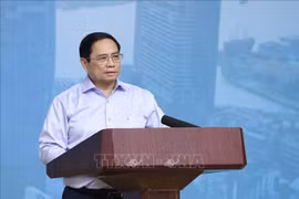 政府总理范明政：国家鼓励各经济成分按照市场机制发展社会保障性住房和工人住房