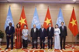 越南国家主席阮春福与联合国秘书长安东尼奥·古特雷斯主持越南加入联合国45周年纪念典礼