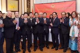 越南政府总理范明政会见旅居比利时越南人社群代表