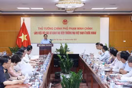 范明政总理：越南驻外经商机构应为国内企业提供更大支持