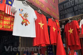 越南人通过纪念品为东运会加油打气