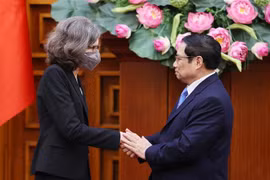 政府总理范明政会见任期届满前来辞行拜会的加拿大驻越大使