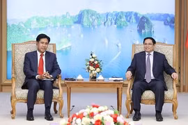 政府总理范明政会见老挝司法部部长帕维·西布阿利法
