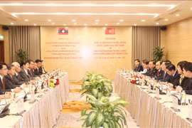 越南-老挝加强分享宣教工作经验